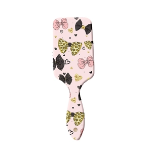 Brosse à cheveux de massage à coussin d'air rose avec motifs nœuds et cœurs