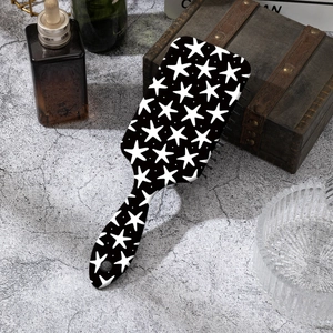 Brosse à cheveux à motif étoiles avec pois noirs et blancs pour massage du cuir chevelu