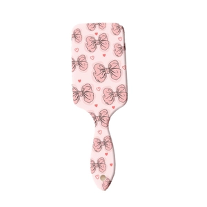 Brosse à cheveux rose à coussin d'air avec motifs nœuds et cœurs pour massage du cuir chevelu