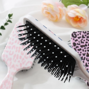 Profi Leopard Haarbürste mit Luftkissen für müheloses Entwirren von nassem und trockenem Haar