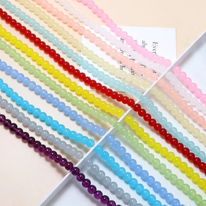 Macro shot of 8mm pastel frosted glass beads in various colors for DIY jewelry making
