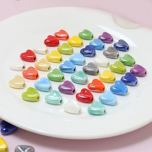 Colorful heart-shaped glazed ceramic beads for DIY jewelry making in various macaron tones