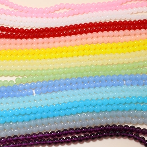 Detailed view of colorful 8mm macaron glass beads for DIY jewelry making and crafts
