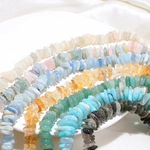 Macro detail of natural assorted chip stone beads for DIY jewelry making and crafts