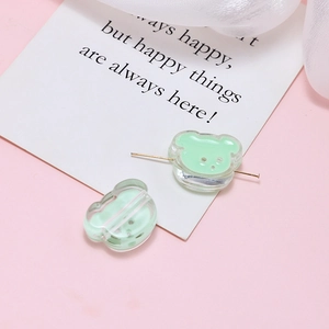 Macro view of light green bear resin beads for DIY handmade jewelry accessories