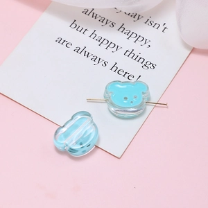 Detailed view of light blue resin bear beads for DIY jewelry making accessories