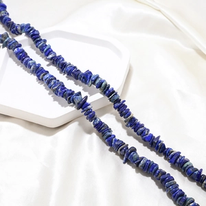 Macro detail of natural lapis lazuli stone beads for DIY jewelry making and necklaces