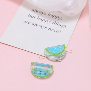 Detailed macro view of blue acrylic watermelon beads for DIY jewelry making accessories
