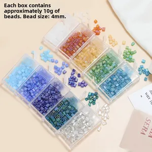 Detailed macro view of 4mm colorful square frosted glass beads in a 10g plastic storage box