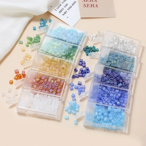 Colorful 4mm frosted square glass beads in a five-compartment organizer for DIY jewelry