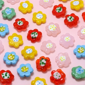 Colorful glass flower beads for DIY jewelry making in various vibrant colors