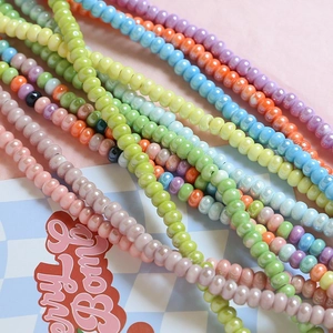 Pastel macaron ceramic beads in various colors for DIY jewelry and necklaces