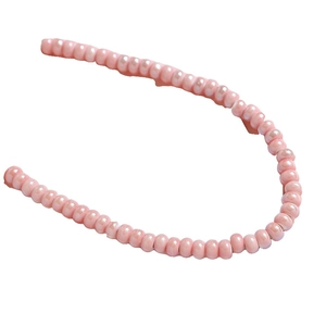 Pastel pink ceramic round beads string for DIY handmade jewelry and accessory crafting