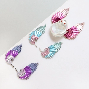 Baroque pearl jewelry set with colorful enamel wing patterns and sparkling crystals