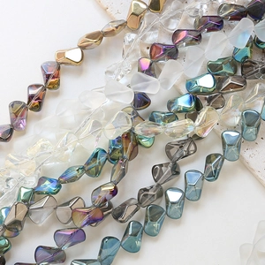 Close-up of irregular iridescent crystal glass beads for DIY jewelry making