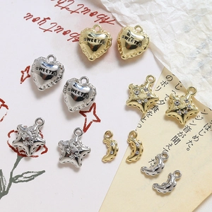 Gold and silver heart, star, and moon charms with zircon stones for DIY jewelry