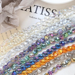 Close-up of colorful faceted crystal glass beads for DIY jewelry making and necklaces