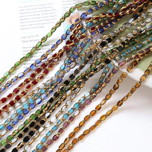 Macro shot of colorful faceted oval glass beads for DIY vintage jewelry making