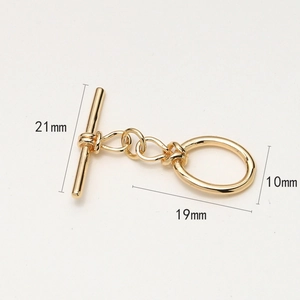 Détail du fermoir à bascule OT marguerite plaqué or avec barre de 21mm pour bijoux DIY