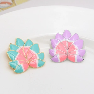 Enameled lotus flower charms in blue and purple tones with gold and silver frames