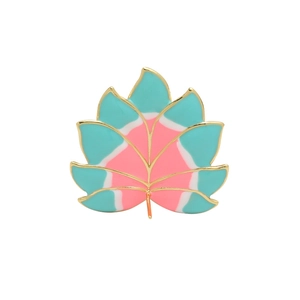 Artistic gold-plated enamel leaf brooch in blue, pink, and white on a clean white background