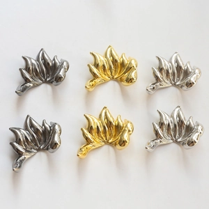 Mirror polished metal flame-shaped DIY jewelry charms in gold, silver, and gunmetal finishes