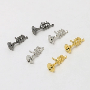 Three pairs of horn-shaped DIY jewelry charms in gold, silver, and gun black finishes