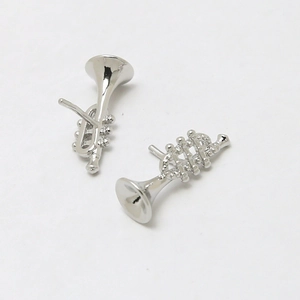 Detailed macro view of silver trumpet-shaped earring components for DIY jewelry making
