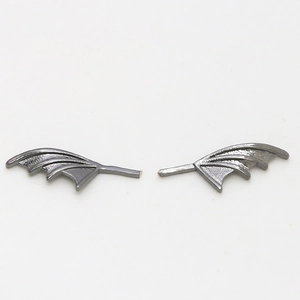 Detailed pair of matte black metal bat wing charms for DIY gothic jewelry making