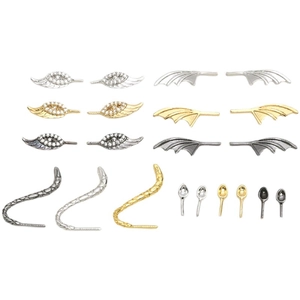 Gold-plated wing and animal tail jewelry charms in silver, gold, and gunmetal finishes