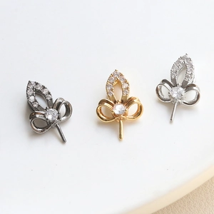 Baroque floral pendant base with white zircons in gold, silver, and gun black finishes