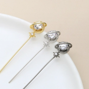 Elegante goldene und silberne Planetenstäbe mit Zirkonia-Besatz in drei Metallausführungen