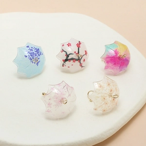Five pieces of floral pattern resin mini umbrella charms with golden hooks for DIY jewelry