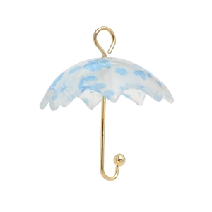 Ghost umbrella pendant featuring blue floral patterns and a gold metal handle