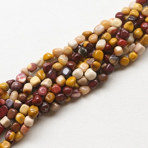 Macro view of polished irregular natural stone beads for DIY jewelry making