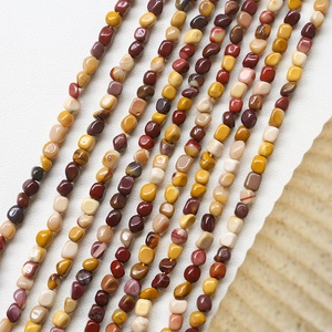 Detailed view of colorful irregular natural stone beads for DIY jewelry making and crafts