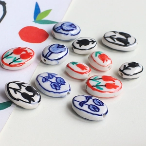 Hand-painted ceramic tulip oval beads in red, blue, and black for DIY jewelry making