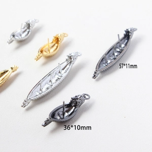 Detail van drakenboot oorbellen basis in goud en zilver, maten 57x11mm en 36x10mm grootte