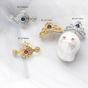 Detail of gold-plated crown and floral zircon pendants for DIY baroque pearl jewelry