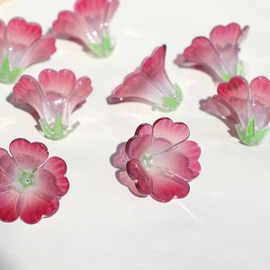 Translucent pink gradient trumpet flower beads with green leaf base for DIY hairpins