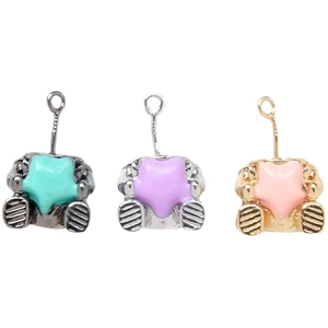 Set of gold and silver astronaut pendants with colorful stars for DIY jewelry making