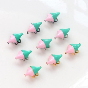 Detailed view of ten pink and green enamel elephant charms for DIY jewelry making