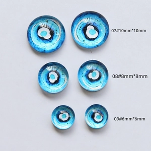 Flatback glass evil eye cabochons in 6mm, 8mm, and 10mm sizes for DIY jewelry making