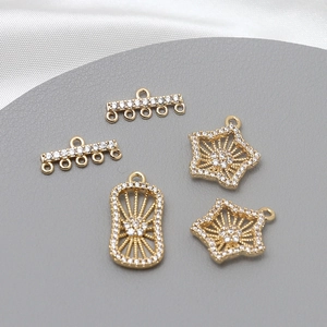 Gold plated star and oval charms with white zircon inlays for DIY jewelry making