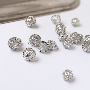 White gold plated hollow sphere pendant with embedded cubic zirconia for DIY jewelry
