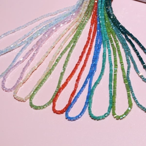 Close-up of 3mm colorful cube crystal beads for DIY handmade jewelry and necklaces