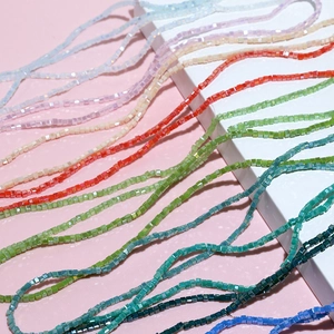 Macro shot of 3mm colorful faceted square crystal beads for DIY jewelry making