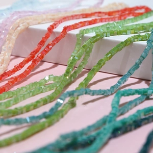 Macro shot of 3mm colorful faceted square crystal beads for DIY jewelry making accessories