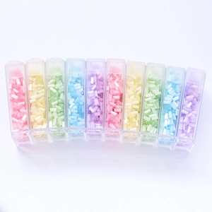 Set of 10 macaron-colored 2mm glass tube beads in transparent organizers for DIY crafts