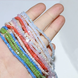 Colorful 3mm square faceted crystal glass beads for DIY jewelry making held in hand